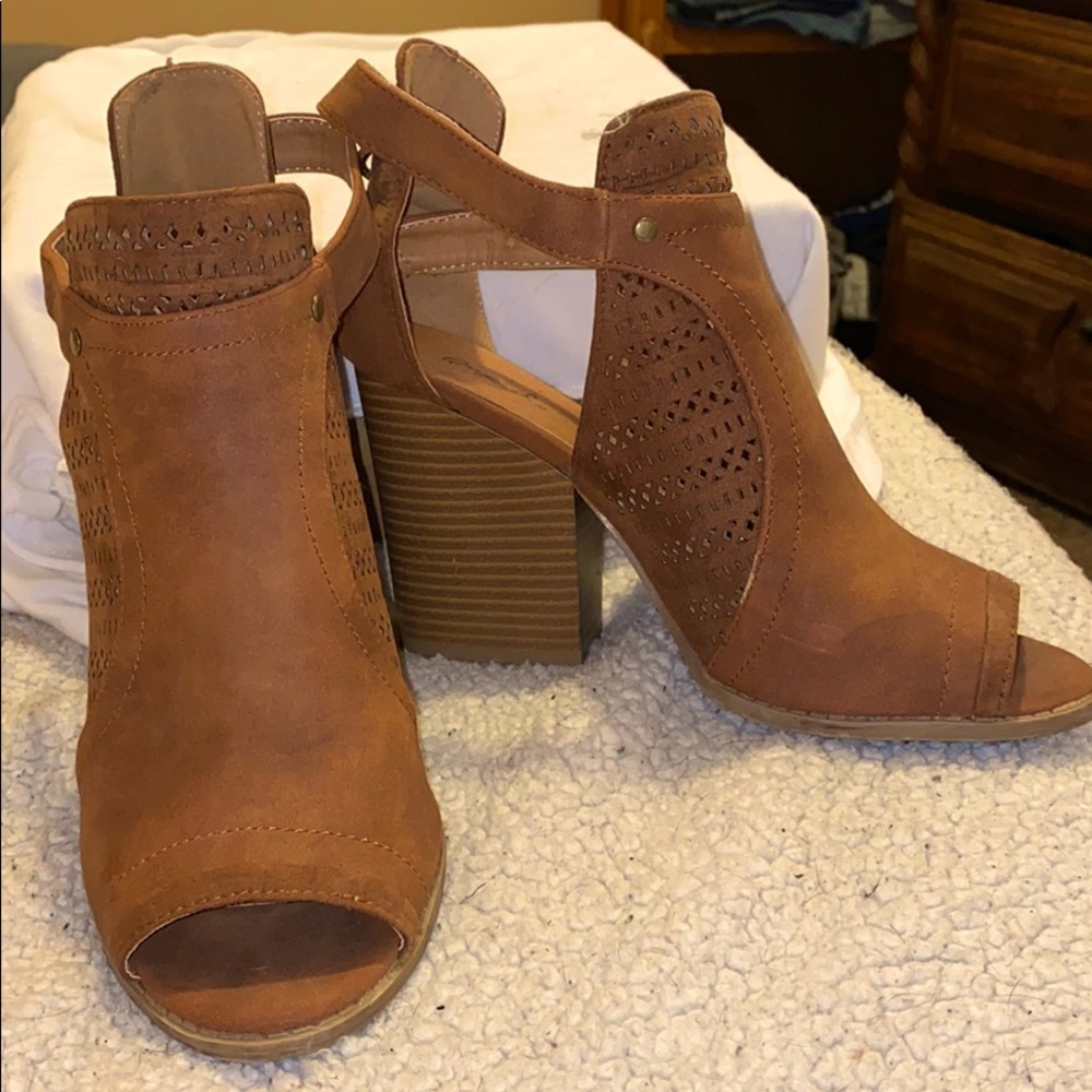 Open toed heeled boots